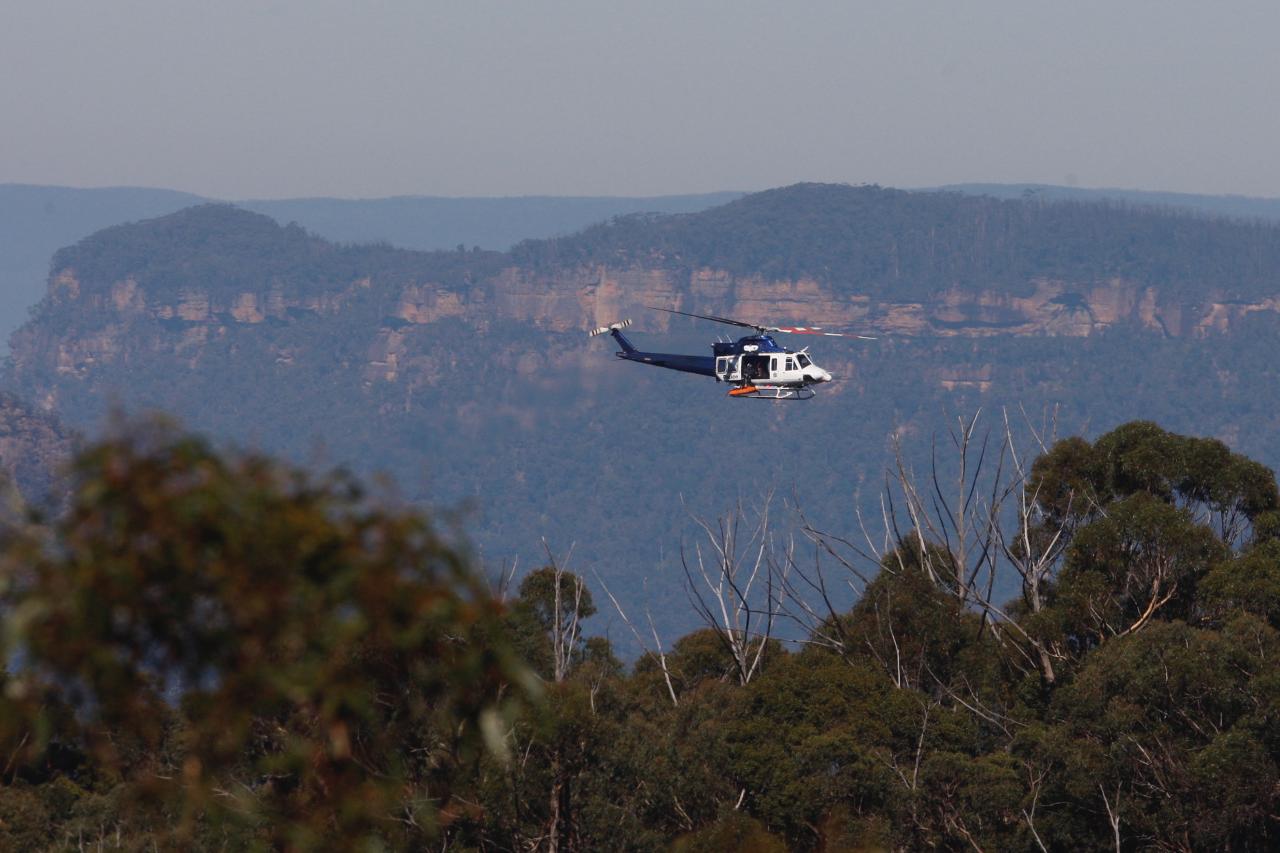 Un helicóptero policial se llevó dos cadáveres del lugar